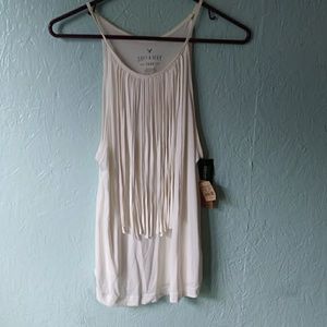 A white tank top with strings that come down